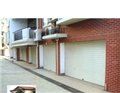 翻板车库门市场|批发|供应商-兴华卷帘门 供应信息